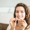 Can I brush my teeth while using Invisalign? | Smile Dental and Implant Centre