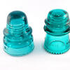 Old glass electric insulators from power poles