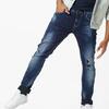 Skinny Fit Distressed Mid-Rise Jeans