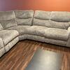 Reclining Sectional Couch and storage holding coffee table